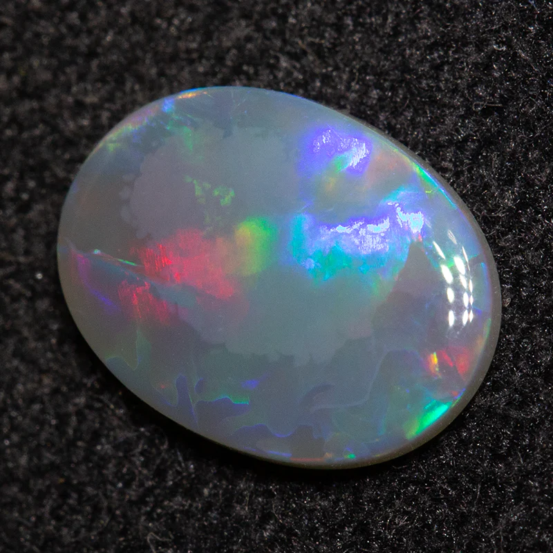 0.62 ct dark opal 8.4x6.3x1.7mm