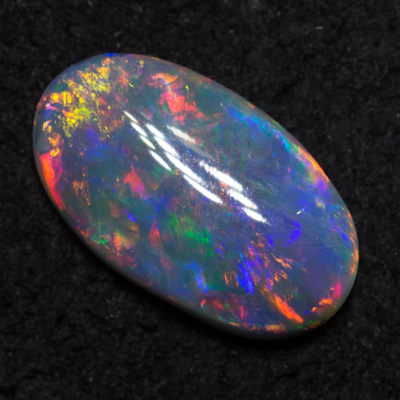 0.63 ct dark opal 9x5.5x2mm