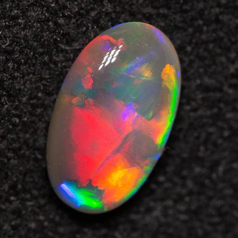 0.63 ct double-sided dark crystal opal 7.9x4.8x2.6mm