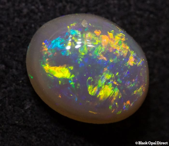 0.63 ct semi black opal 6.5x5x3mm