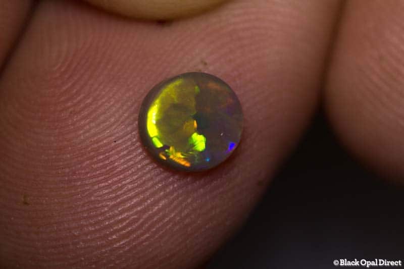 0.63 ct semi black opal 6.5x6x1.5mm