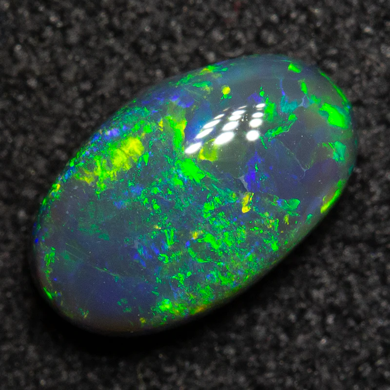0.64 ct black opal 7.1x4.5x3.1mm