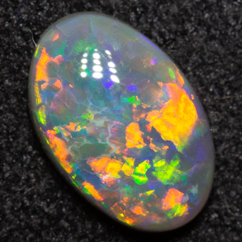 0.64 ct dark opal 7.7x5x2.6mm