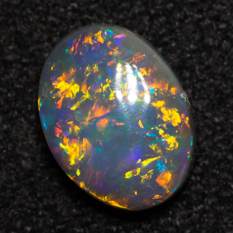 0.64 ct dark opal 7x5.3x2.7mm