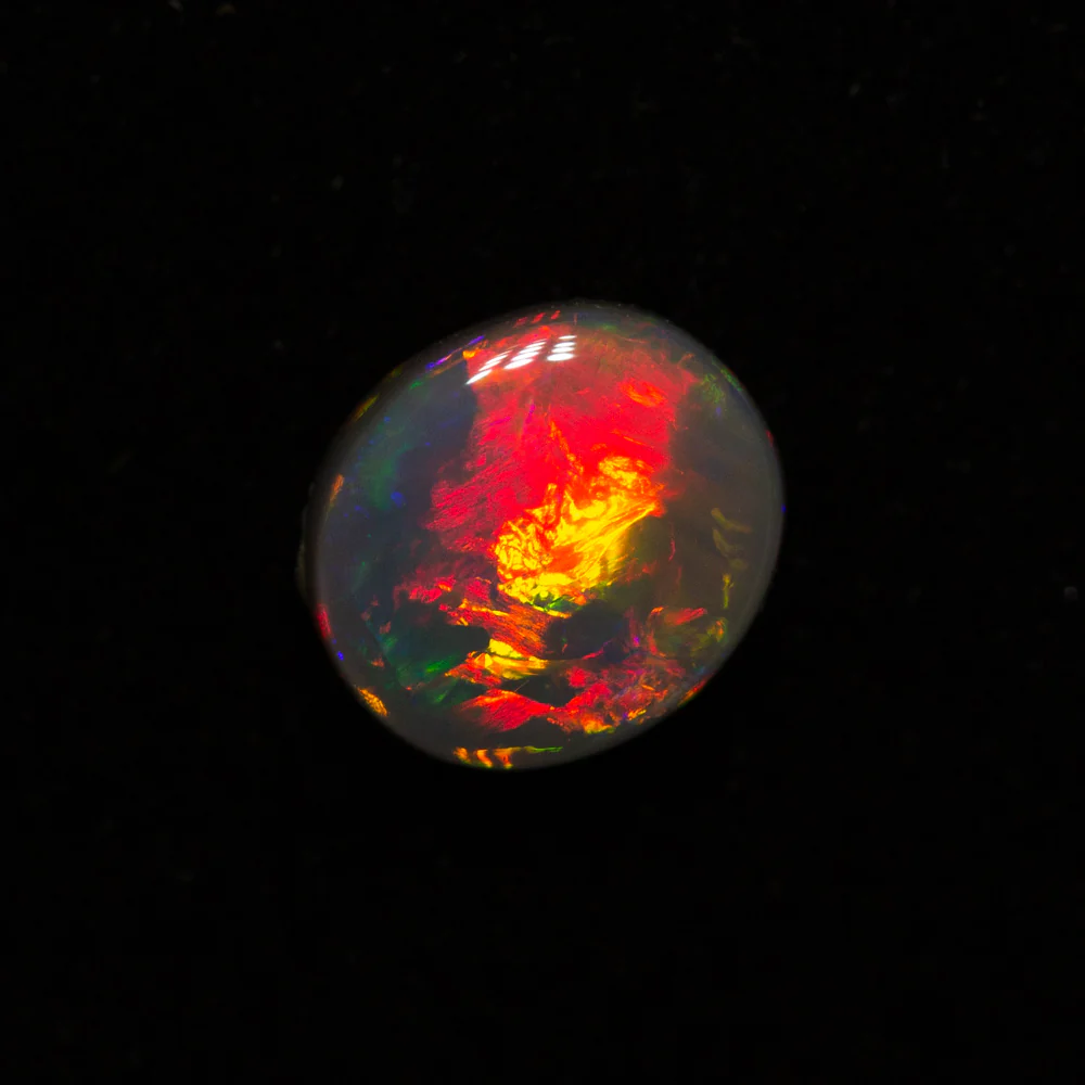 0.64 ct gem black opal 6.3x5.5x2.6mm