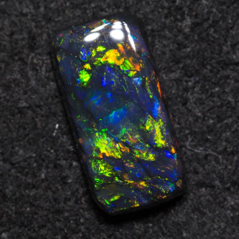 0.65 ct black opal 8.2x4x2.2mm