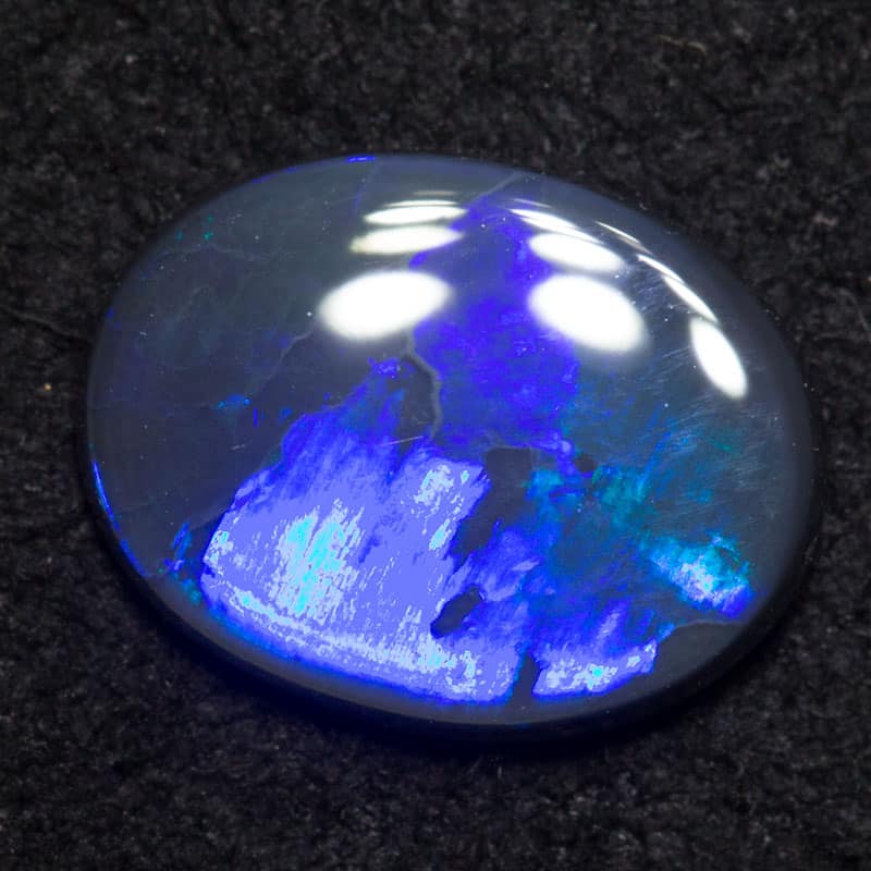 0.65 ct black opal 8.2x6x1.5mm