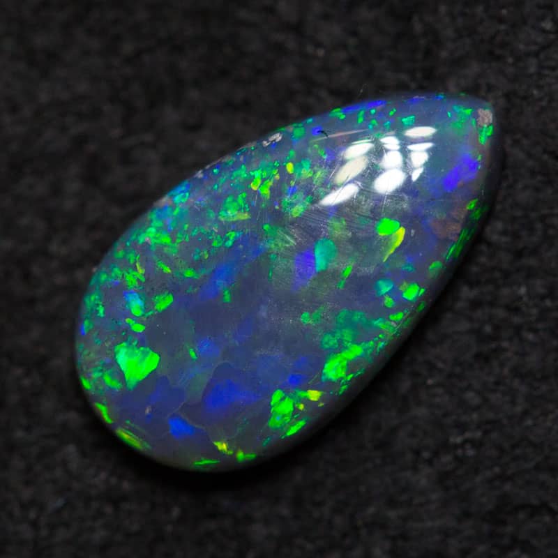 0.65 ct black opal 8.5x4.7x2.5 mm