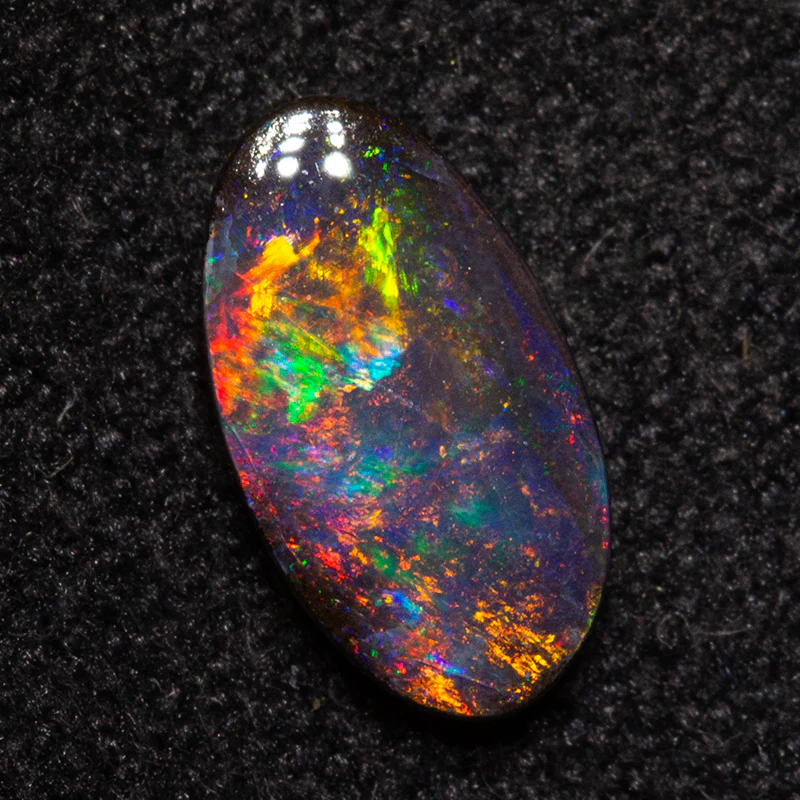 0.65 ct boulder opal 7.6x4.2x1.8mm