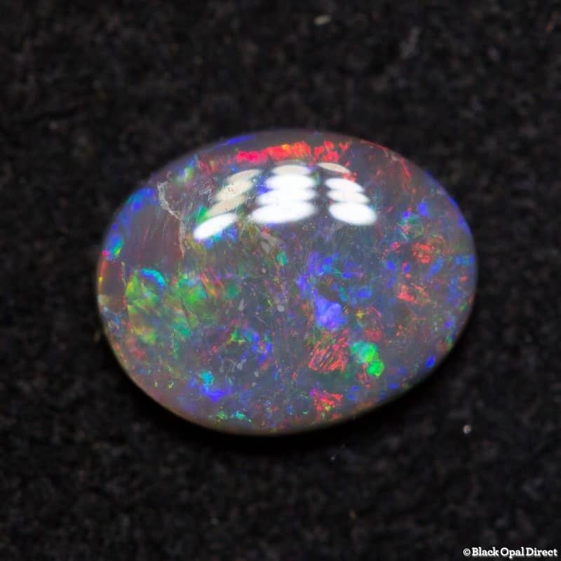 0.65 ct dark opal 7x5.5x2mm