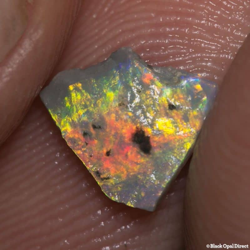 0.65 ct rough opal piece 8mm across