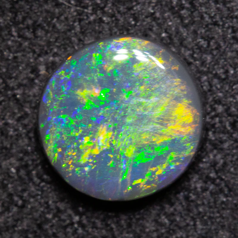 0.66 ct black opal 6.2x6.1x2.3mm