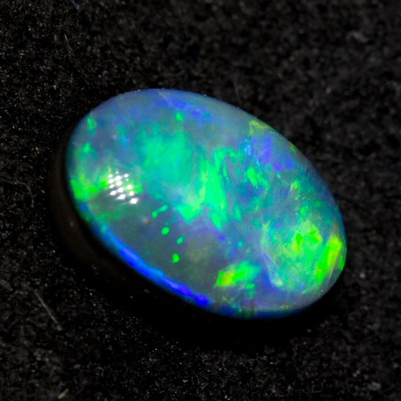 0.66 ct black opal 7x4.8x2.7mm