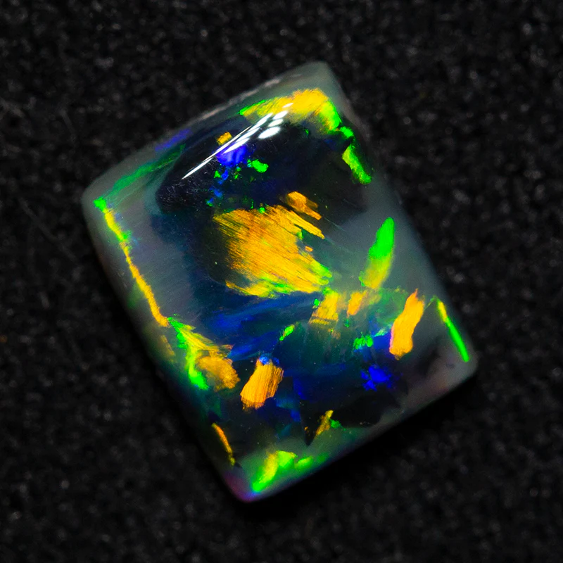 0.66 ct dark opal 6.3x5.1x2.4mm