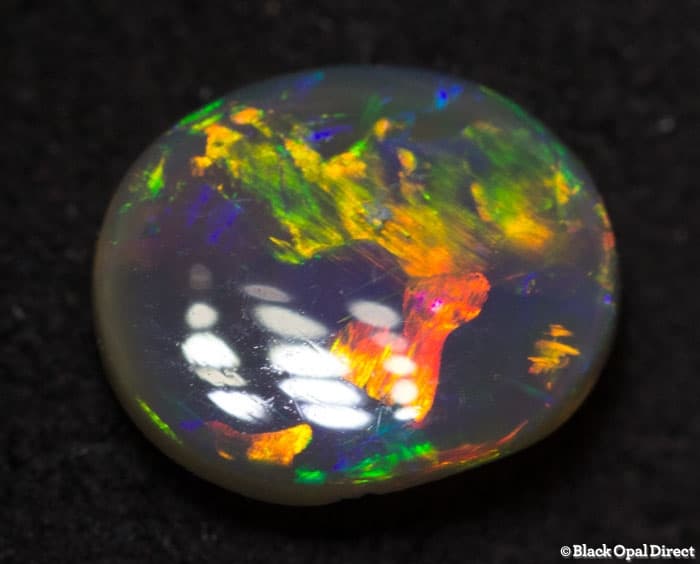 0.66 ct semi black opal 7x6x2.5mm