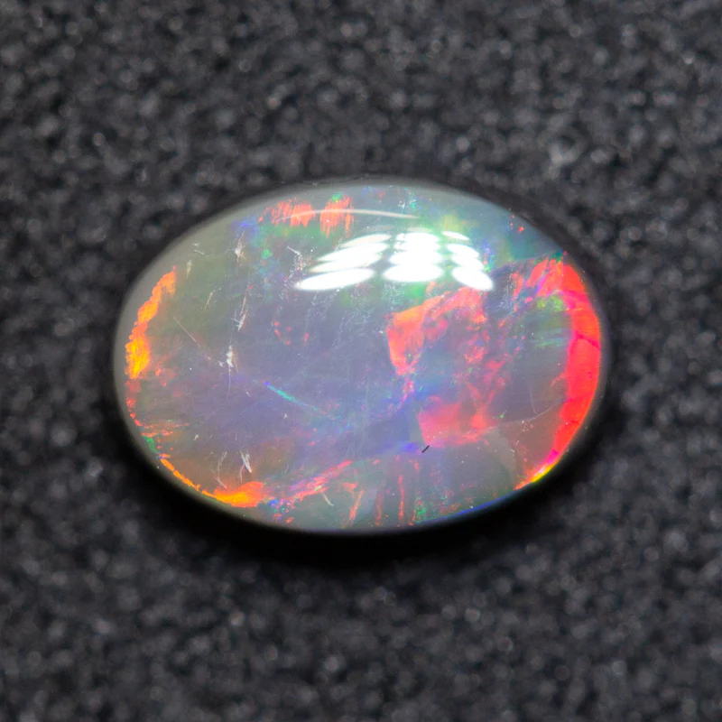 0.67 ct black opal 7x5x2.7mm