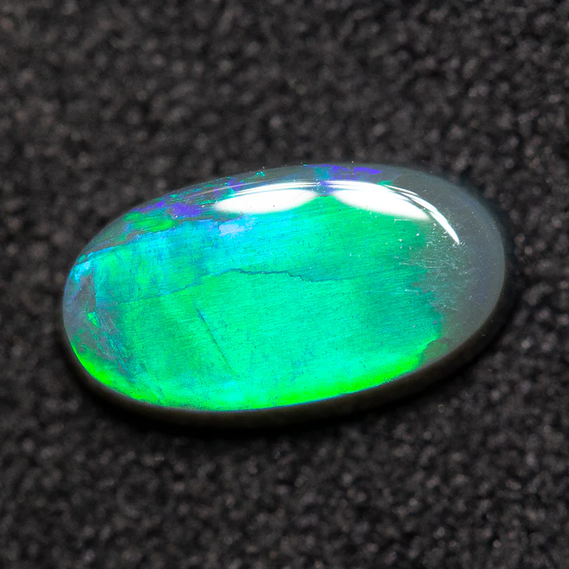 0.67 ct black opal 8.5x4.2x2.2mm