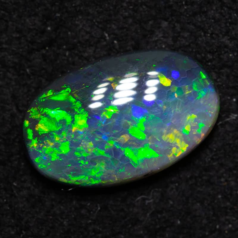 0.67 ct black opal 8.5x5.3x2.2mm
