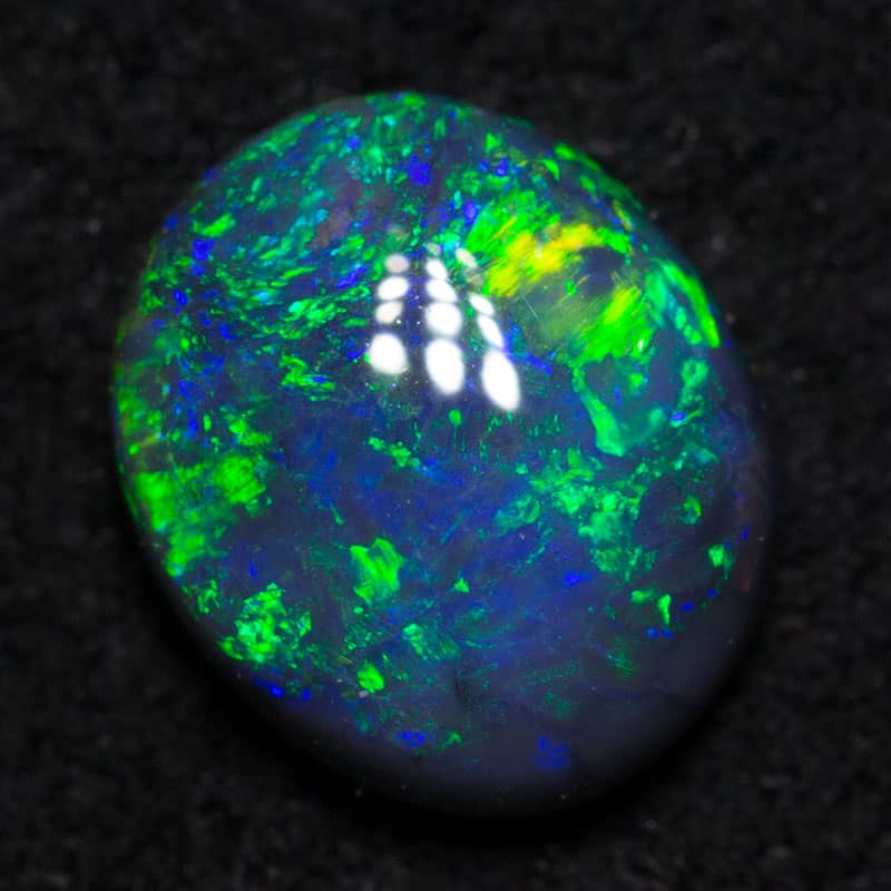 0.68 ct black opal 6.5x5x2.5mm