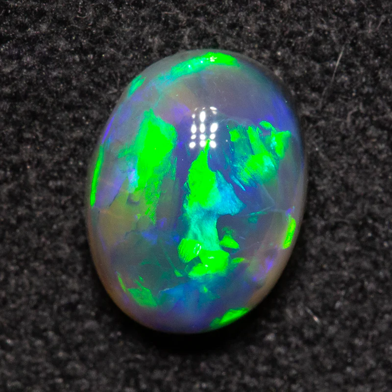 0.68 ct black opal 6.8x5.1x3mm