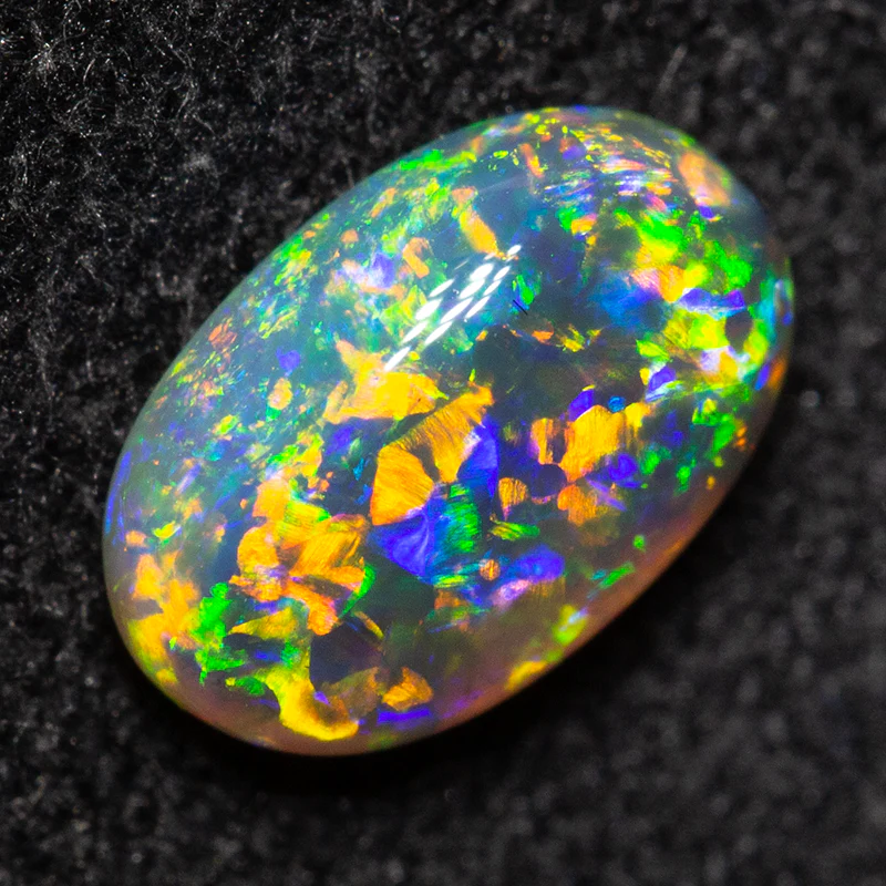 0.68 ct black opal 7.5x4.7x2.8mm