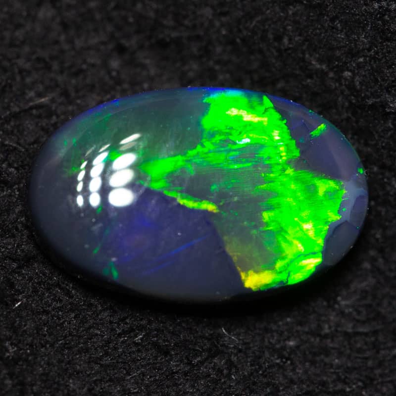 0.68 ct black opal 8.1x5.1x2.4mm