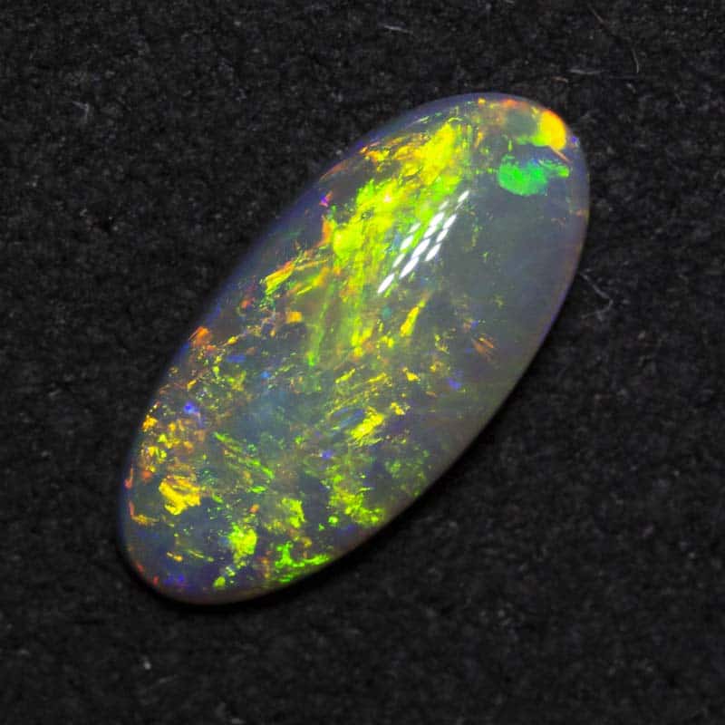 0.68 ct dark opal 10.2x4.9x2.2mm