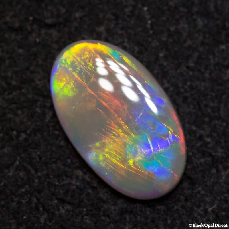0.68 ct dark opal 9x5x2mm