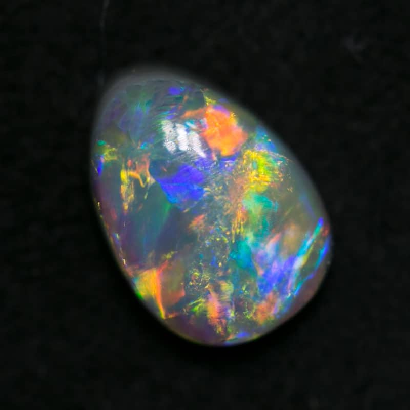 0.68 ct drop shaped dark opal 7x5x2.5mm