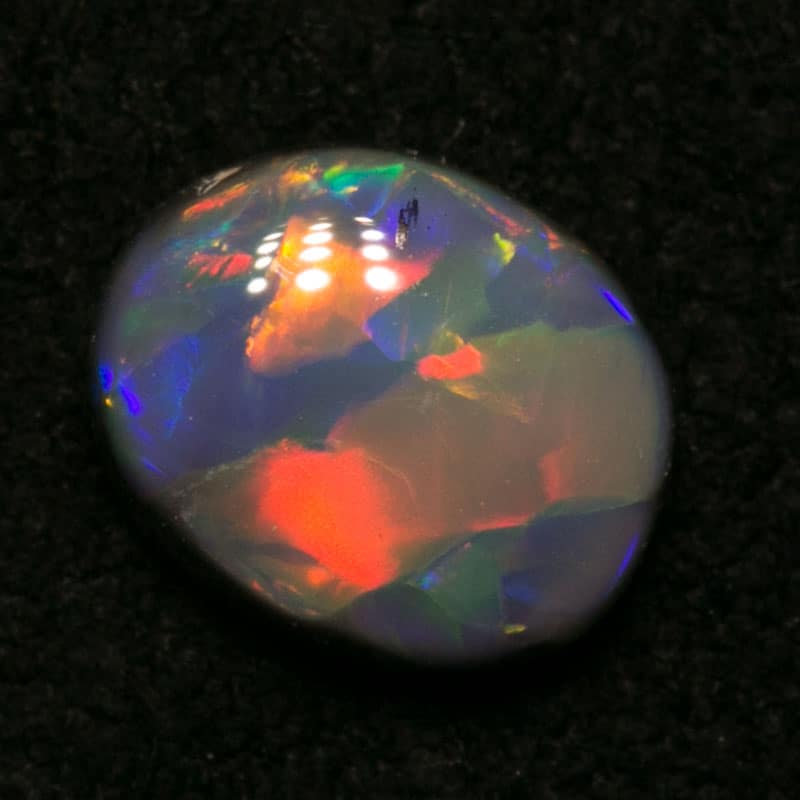 0.68 ct gem black opal 6x5x2.5mm
