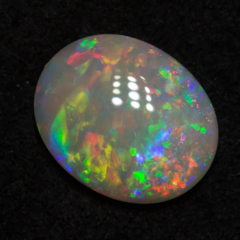0.68ct white opal 13x6x2mm