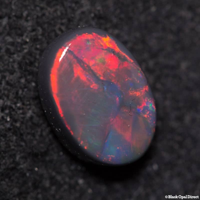 0.69 ct black opal 7x5x2.5mm