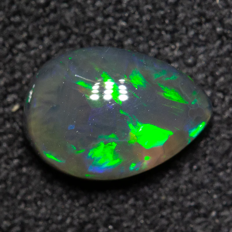 0.69 ct black opal 7x5x3mm