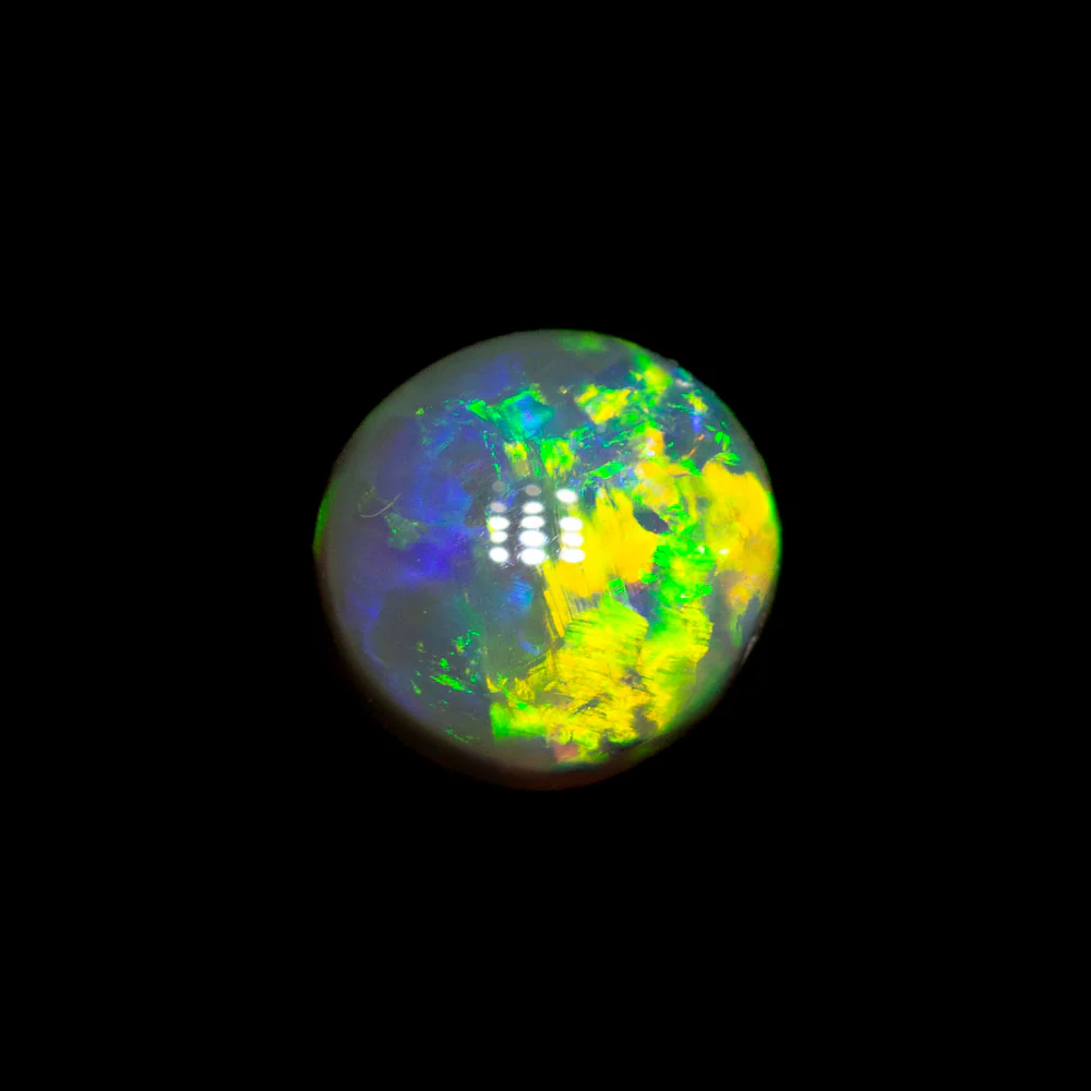 0.69 ct crystal opal 5.4x5.1x3.9mm