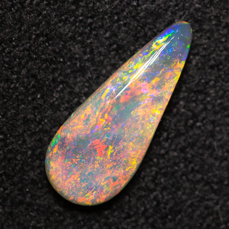 0.69 ct dark opal 10.9x4.5x2.3mm