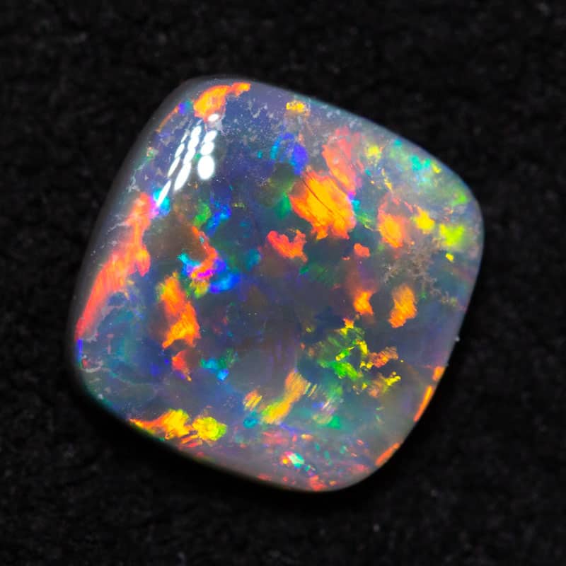 0.70 ct black opal 7.5x6.4x2.2mm