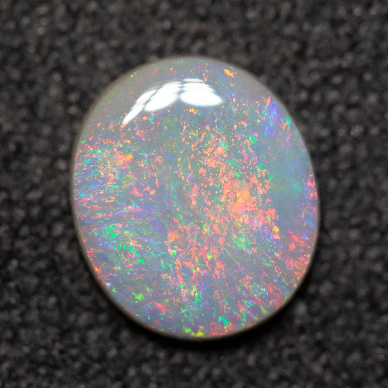 0.70 ct dark opal 7.4x6.4x2mm