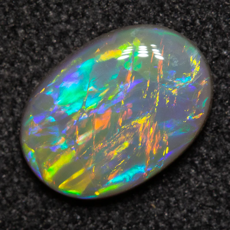 0.70 ct dark opal 8.1x5.8x2.1mm