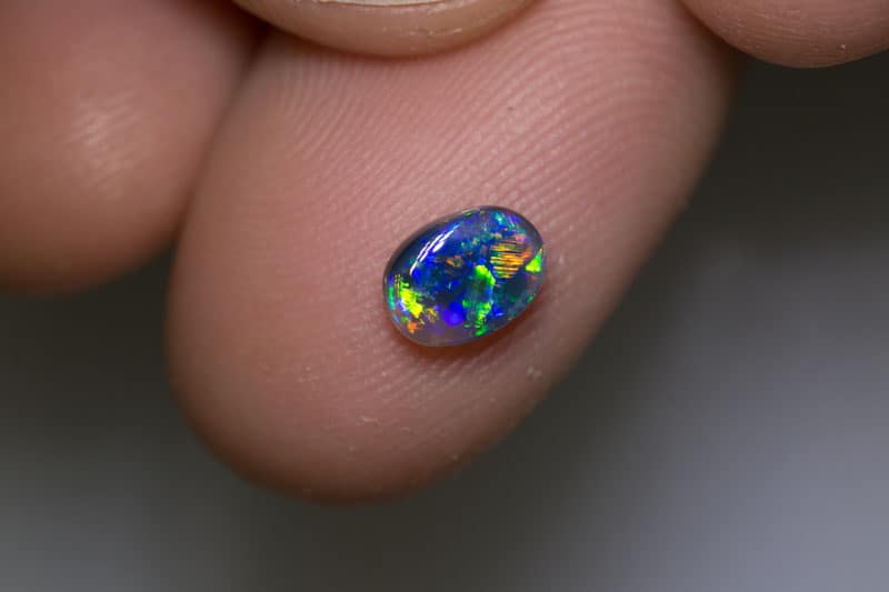 0.70 ct gem black opal 7x5x2.5mm