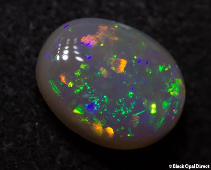 0.70 ct semi black opal 7x5.5x3mm