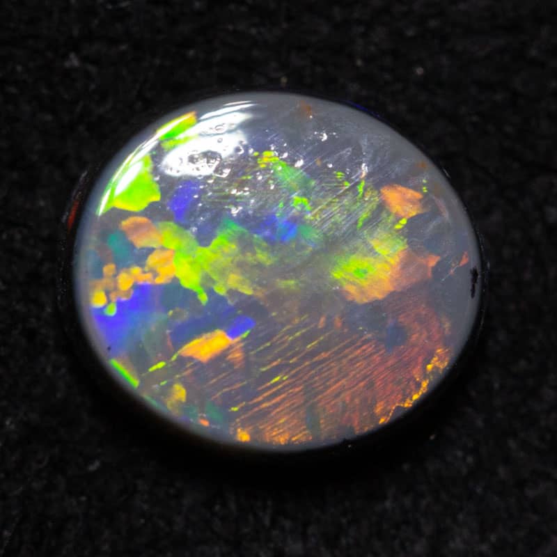 0.70ct black opal 6.5x4.8x2.4mm