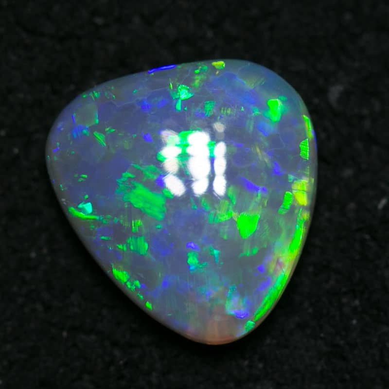 0.70ct dark opal 7x6.5x2mm