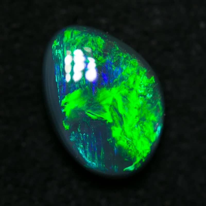 0.71 ct black opal 7x5x2.5mm
