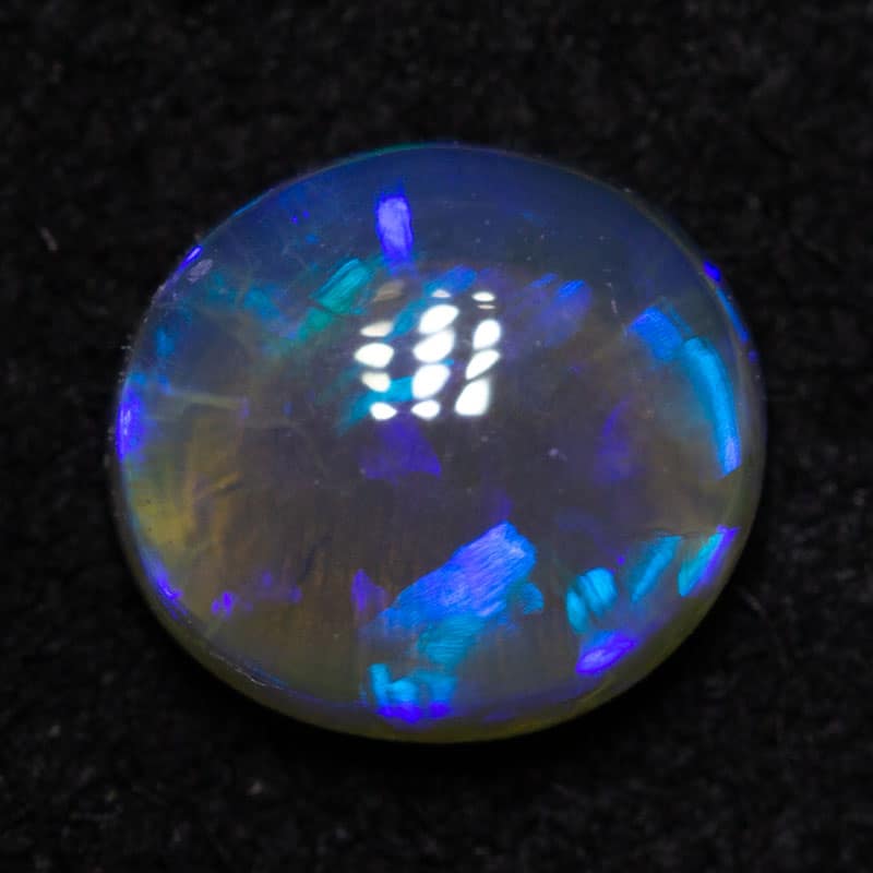 0.71 ct dark crystal opal 6.2x5.6x3mm
