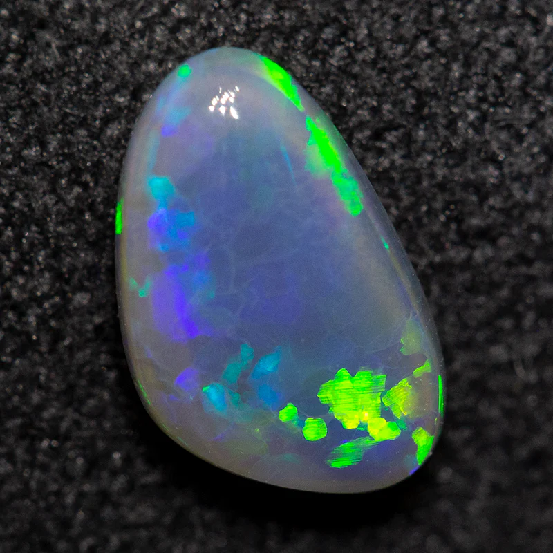 0.71 ct dark opal 8x5x2.5mm