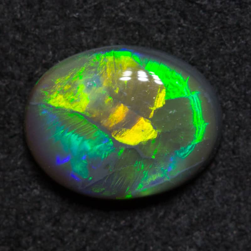 0.71ct black opal 7.5x6x2.5mm
