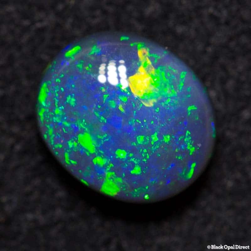 0.72 ct black opal 6.5x5.5x3mm