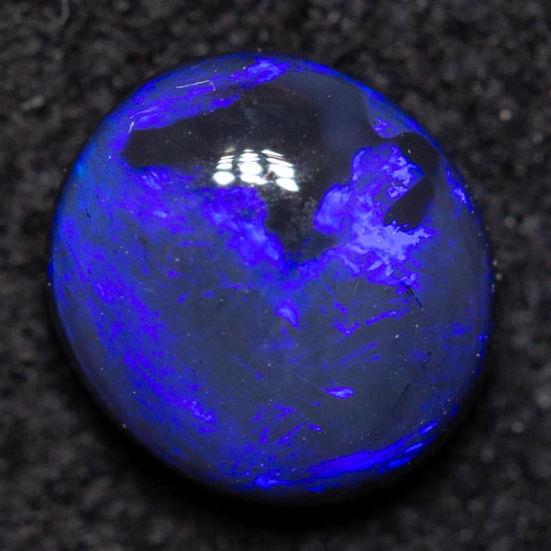0.72 ct black opal 6.5x5x3mm