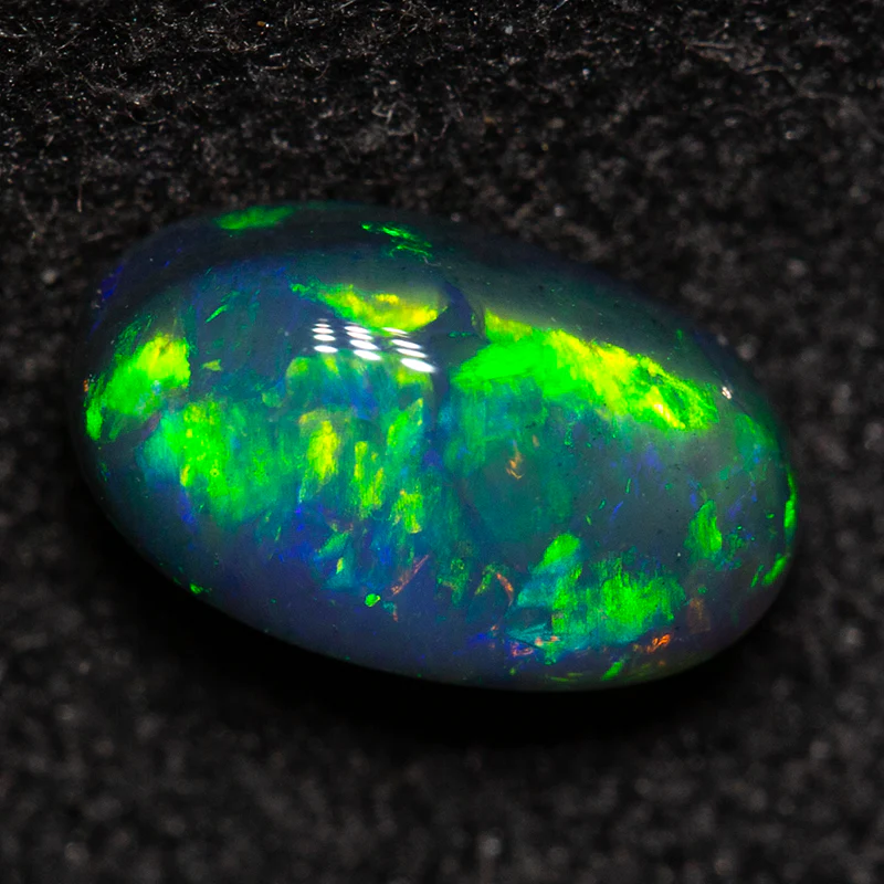 0.72 ct black opal 7.4x4.2x3.2mm - Image 2