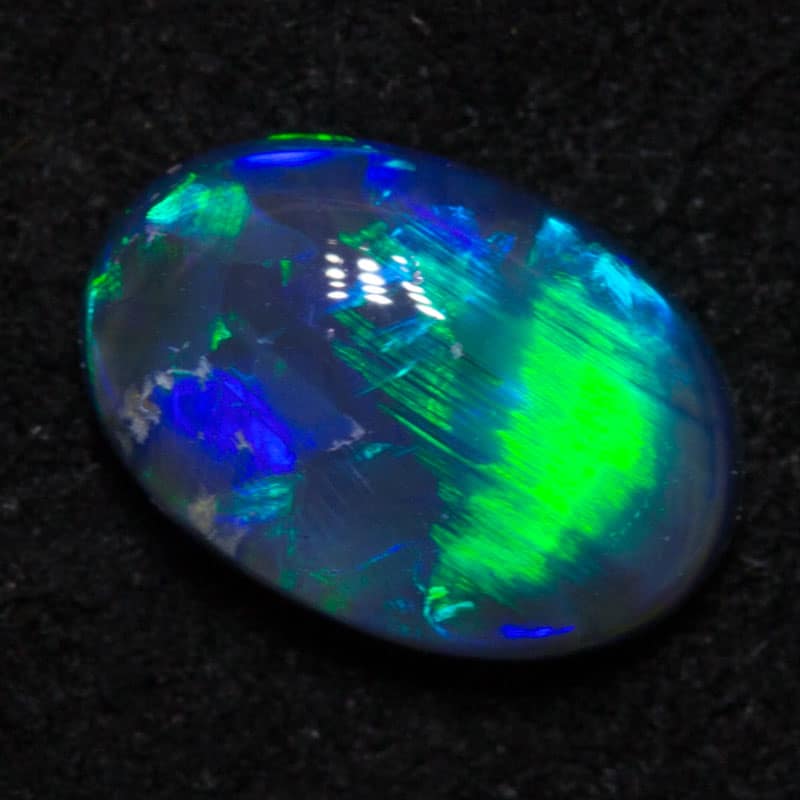 0.72 ct black opal 7.5x5x3mm